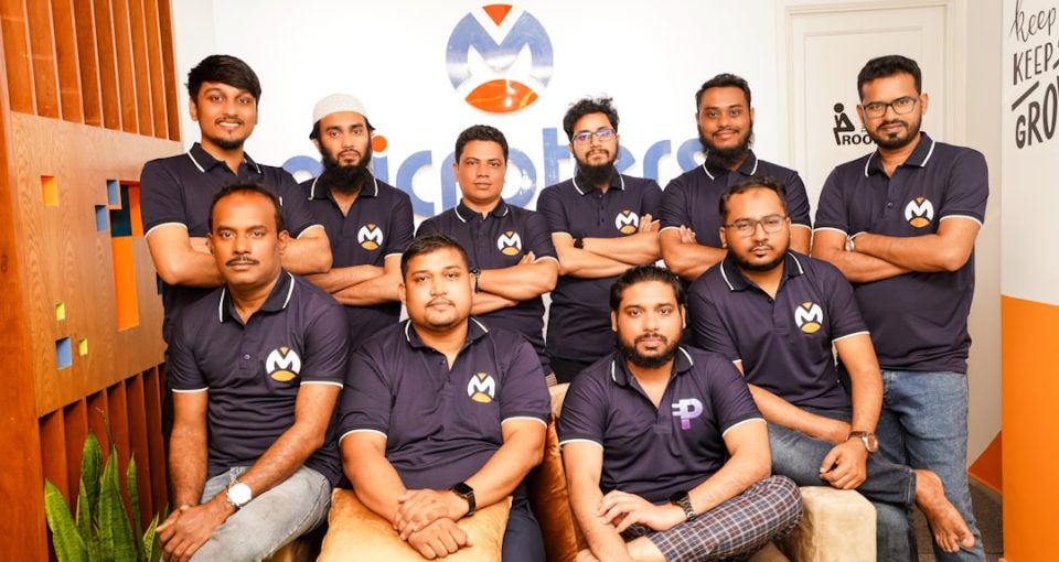 uk-entrepreneur-support--a-group-of-men-sitting-next-to-each-other
